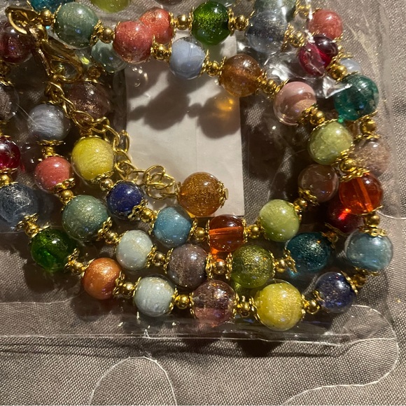 BRAND NEW SEALED  2 pouches 1 necklace 1 bracelet! - Picture 4 of 6